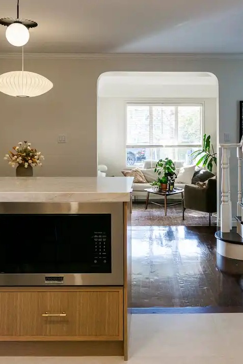 Open plan kitchen looking through to the living room in a full home transformation